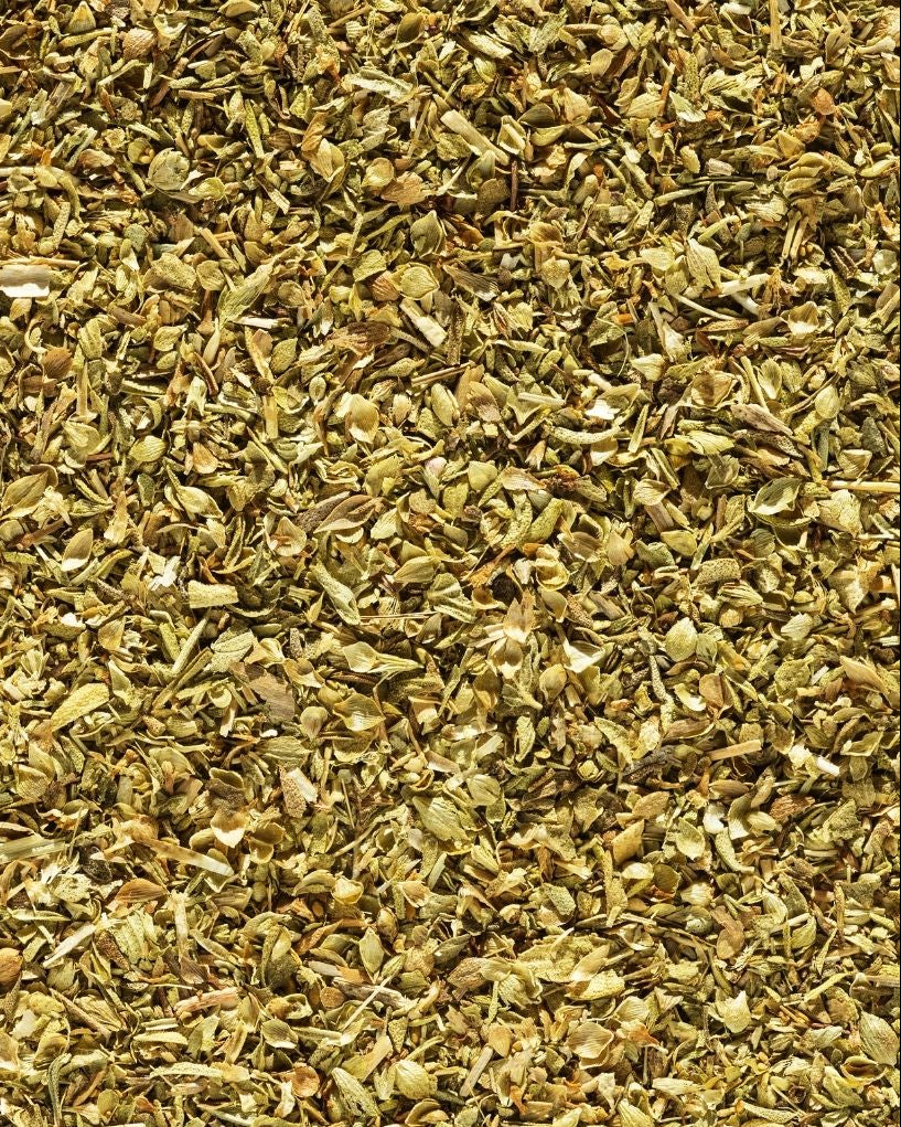 A close-up image of dried oregano leaves.