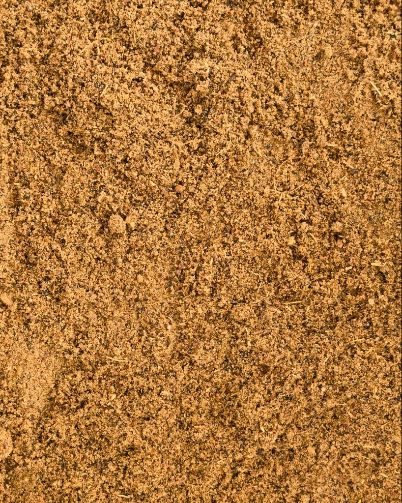 A close-up image of ground garam masala spices.