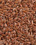 A close-up image of brown flaxseeds.
